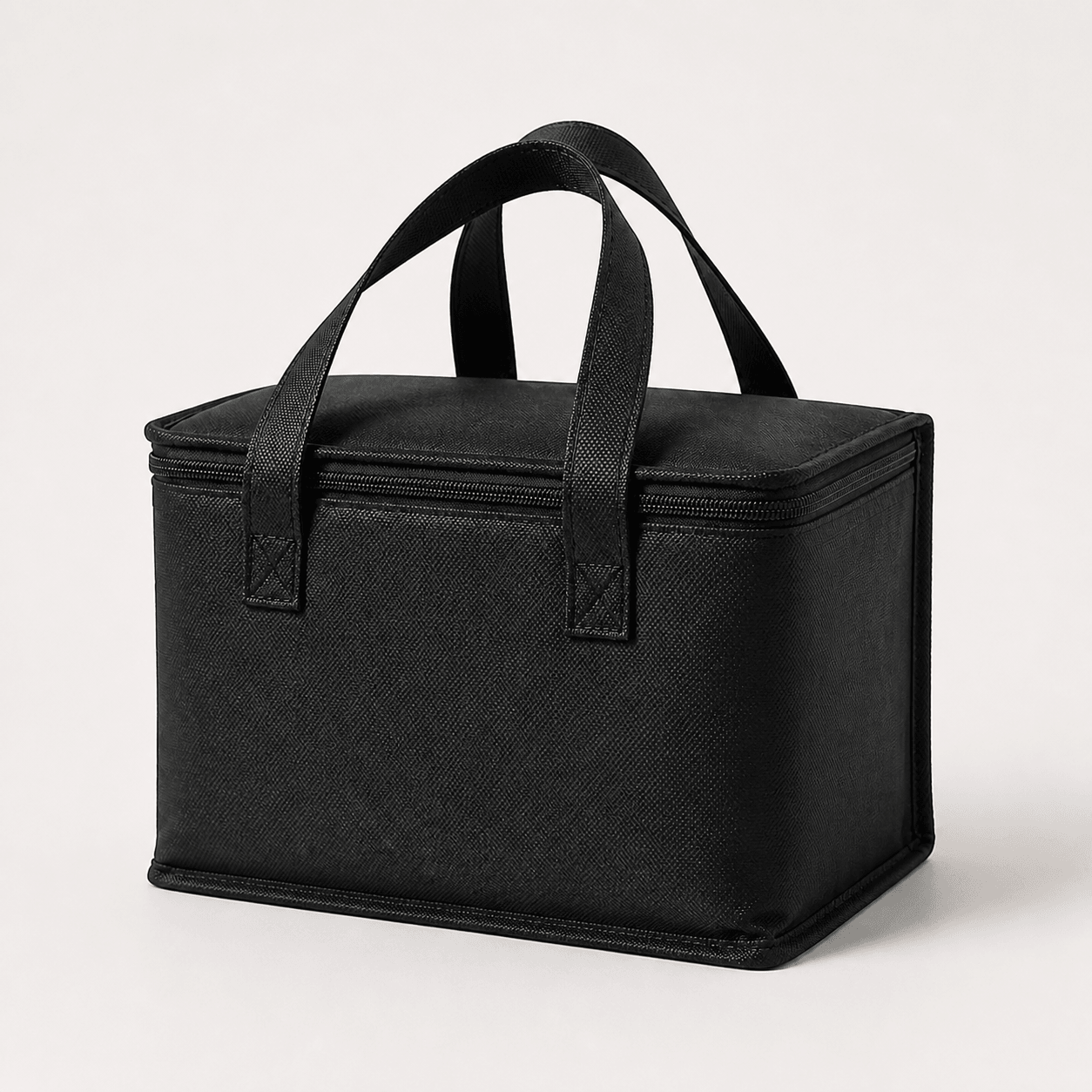Black insulated bag in a clean studio product view